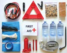 Items to keep in your car laid out side by side 