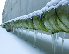 Outdoor pipe covered in ice