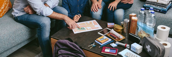 family sitting on the couch going over documents