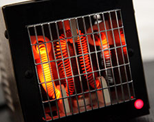Space heater with hot orange coils